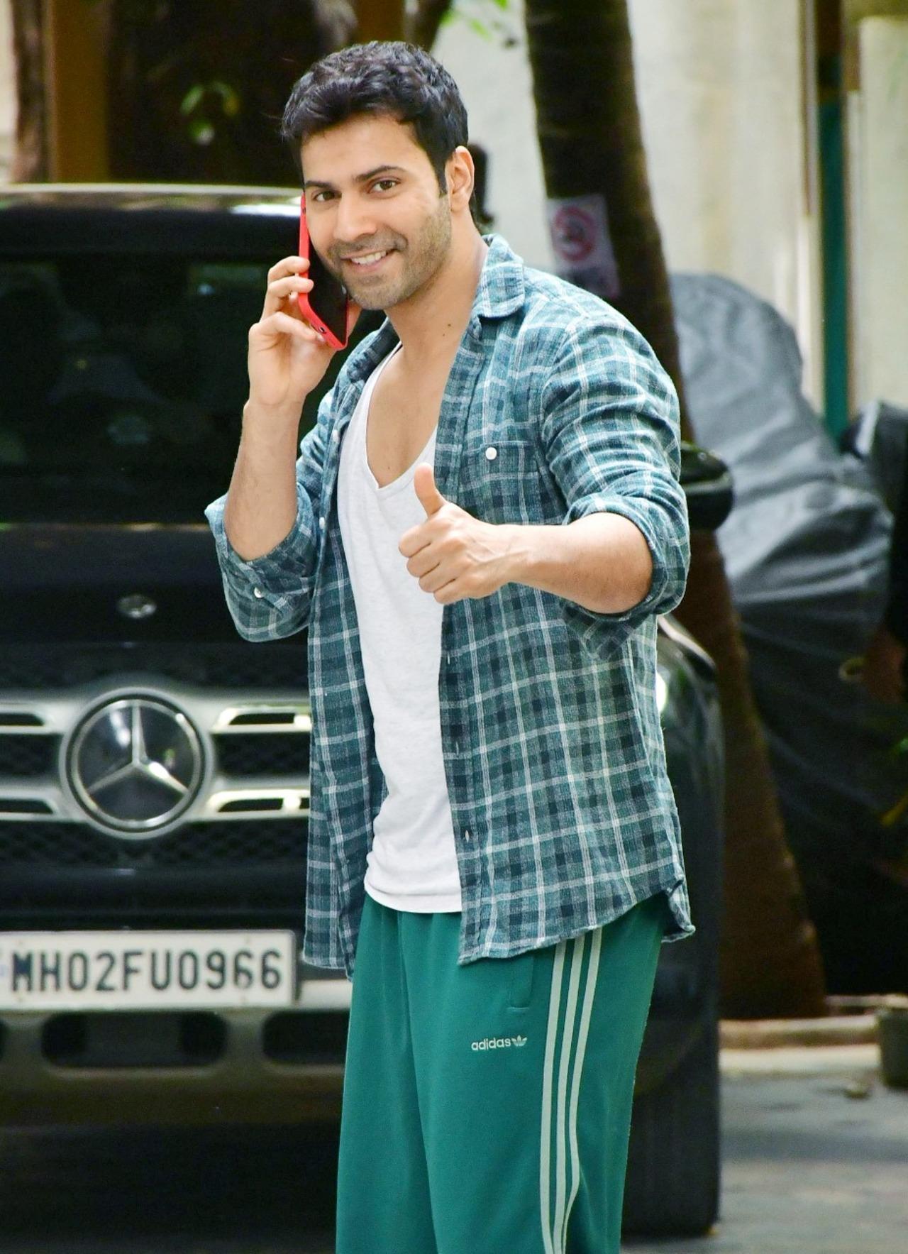 Actor Varun Dhawan was also seen in a fun mood as he stepped out. He opted for casual look in green chequered shirt which he paired with white t-shirt and green pants.